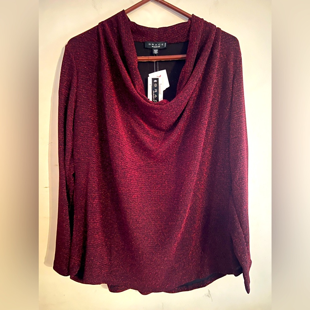 Elegant blouse for evening wear or business. Never worn.